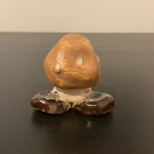 Unique folk art goomba made from clay